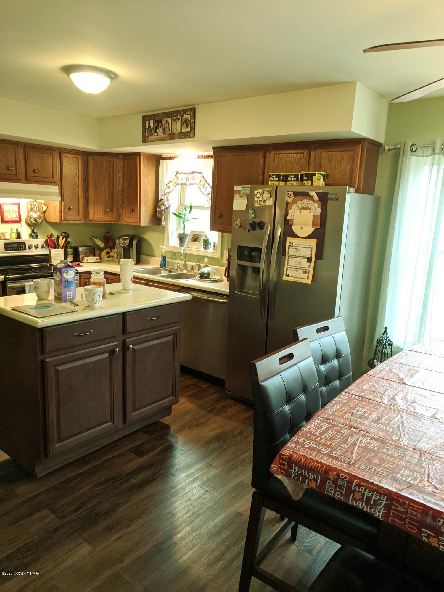 1610 Cotswald Road Tobyhanna, PA 18466 - Photo 6 of 32 KITCHEN ISLAND