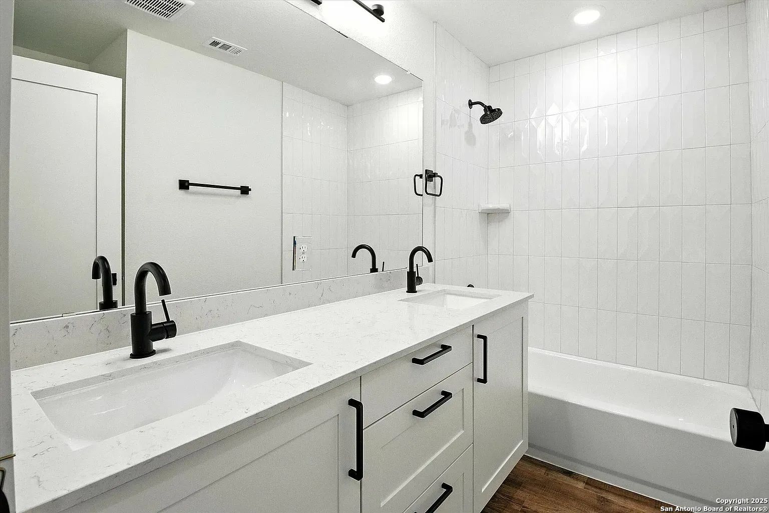 1809 North Peach Creek Drive, Unit 3C Dayton, TX 77535 - Photo 8 of 23 a bathroom with a sink and a mirror