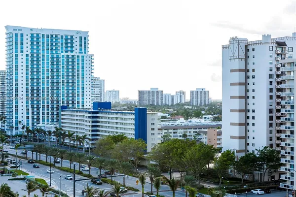 a view of a city with tall buildings