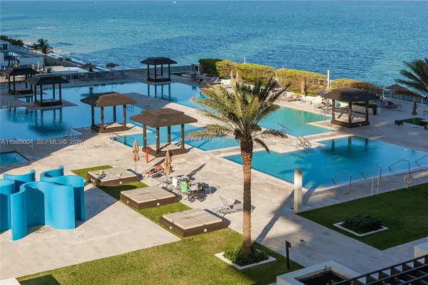 a patio with a table and chairs