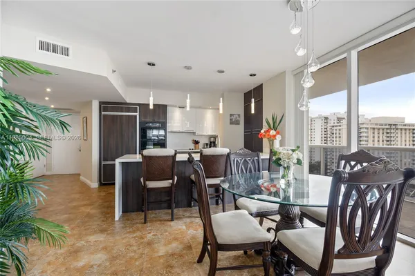 a view of a dining room with furniture