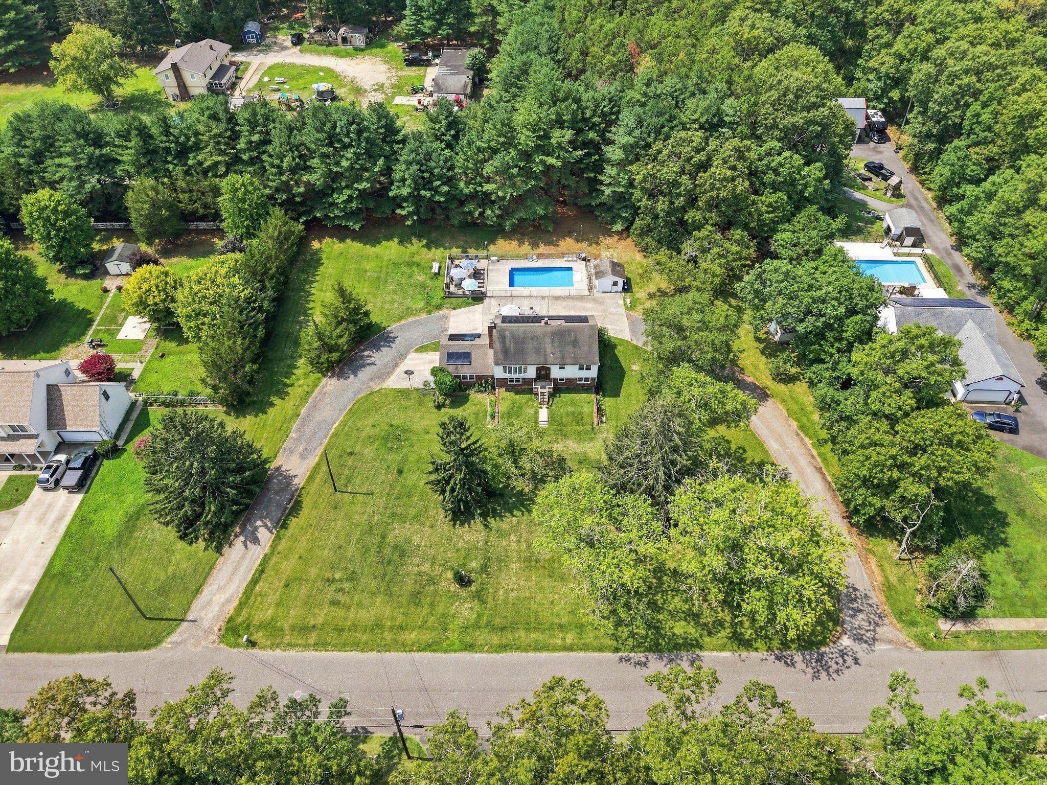 Spacious retreat surrounded by greenery.