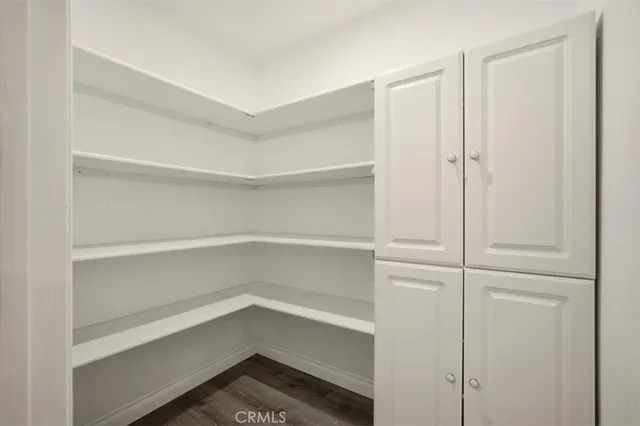 a storage room with washer and dryer