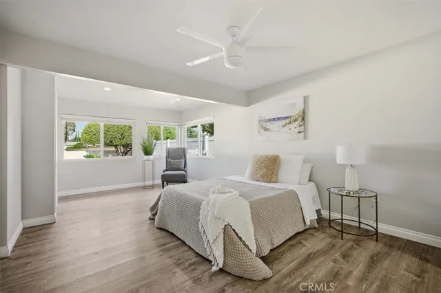 a bed room with a bed and a window