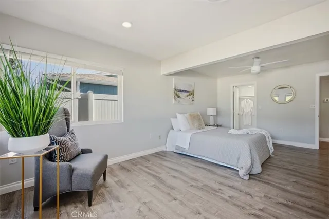 a room with a bed and a window