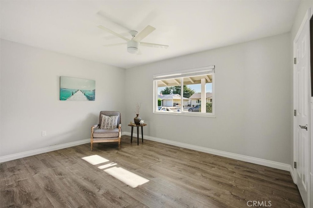 29326 Carmel Road Menifee, CA 92586 - Photo 32 of 44 a living room with furniture and a window