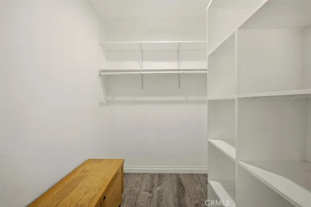 a view of an empty walk in closet