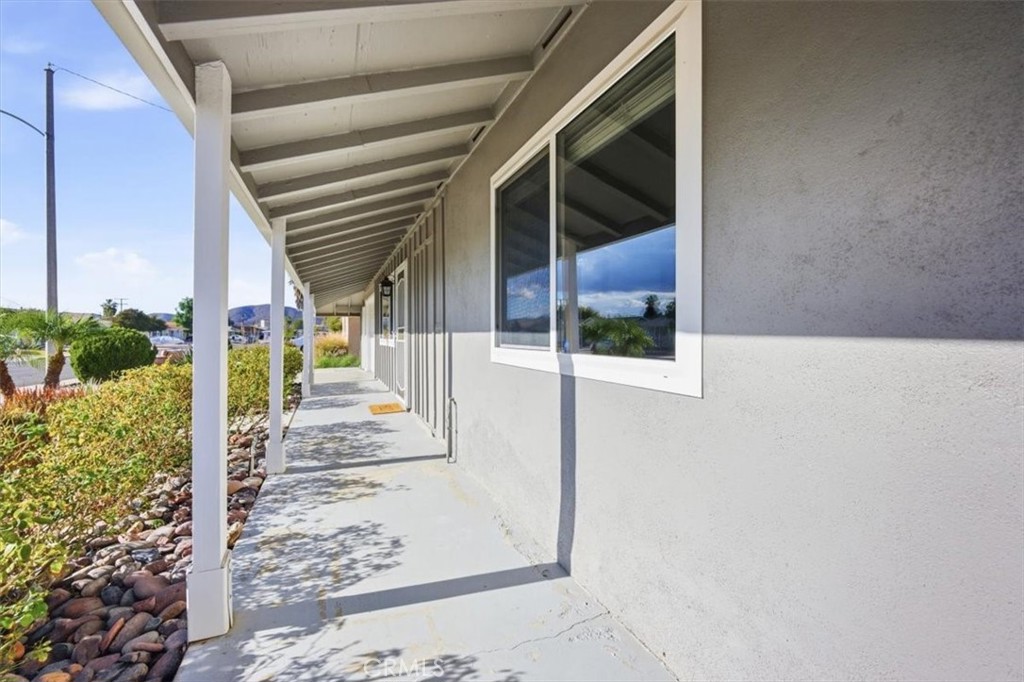 29326 Carmel Road Menifee, CA 92586 - Photo 5 of 44 a view of a house with a porch