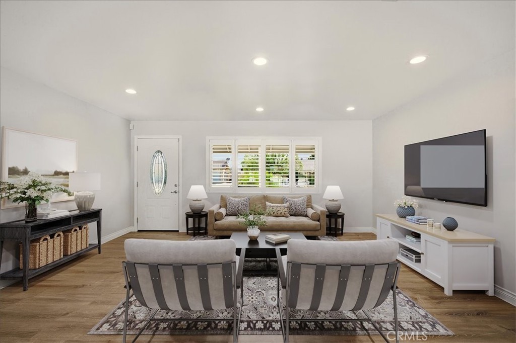 29326 Carmel Road Menifee, CA 92586 - Photo 9 of 44 a living room with furniture and a flat screen tv