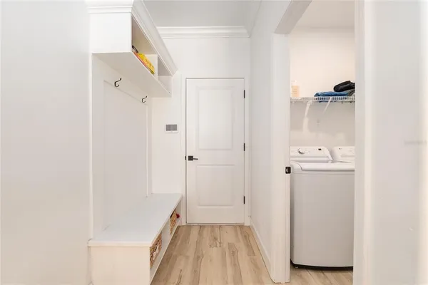 a bathroom with a double vanity sink and mirror