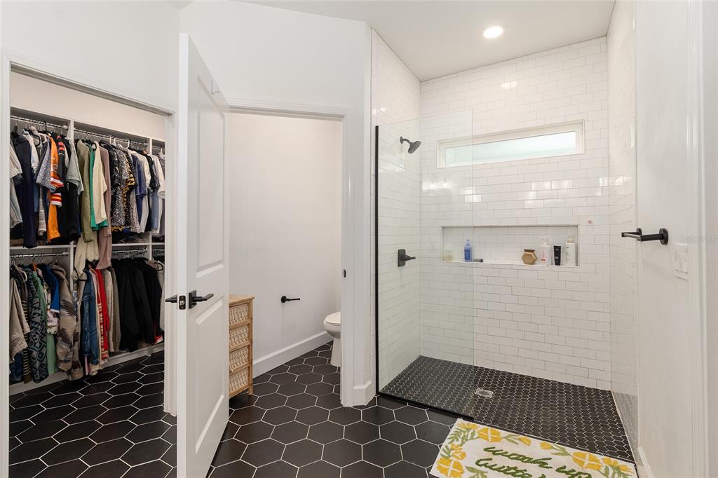 1759 Southwest 67th Circle Gainesville, FL 32607 - Photo 38 of 66 a bathroom with a bathtub and a shower