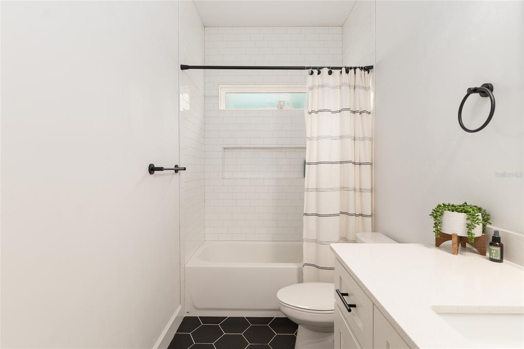 1759 Southwest 67th Circle Gainesville, FL 32607 - Photo 43 of 66 a bathroom with a sink toilet and shower