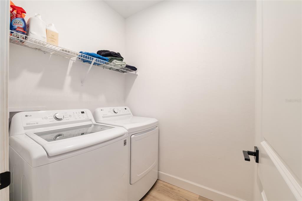 1759 Southwest 67th Circle Gainesville, FL 32607 - Photo 47 of 66 a utility room with dryer and washer