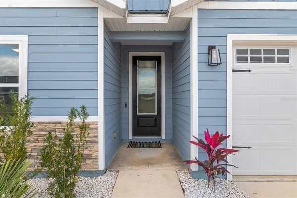 wooden floor in a hall with a window