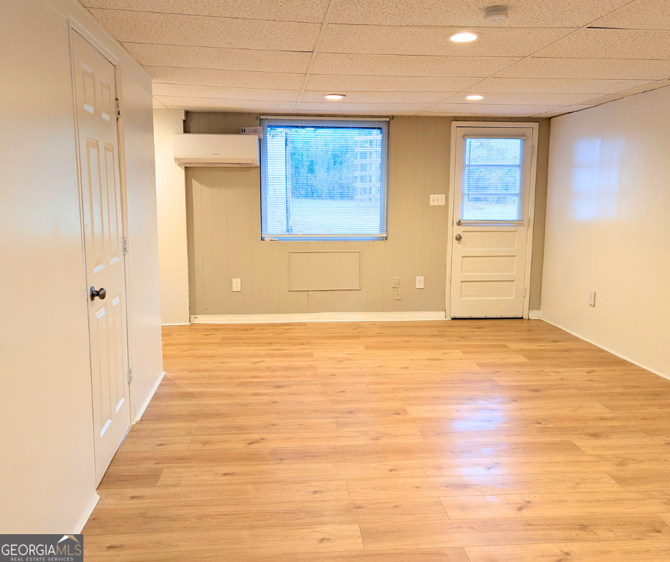 1701 Sharon Drive Albany, GA 31707 - Photo 15 of 18 a view of an empty room with wooden floor