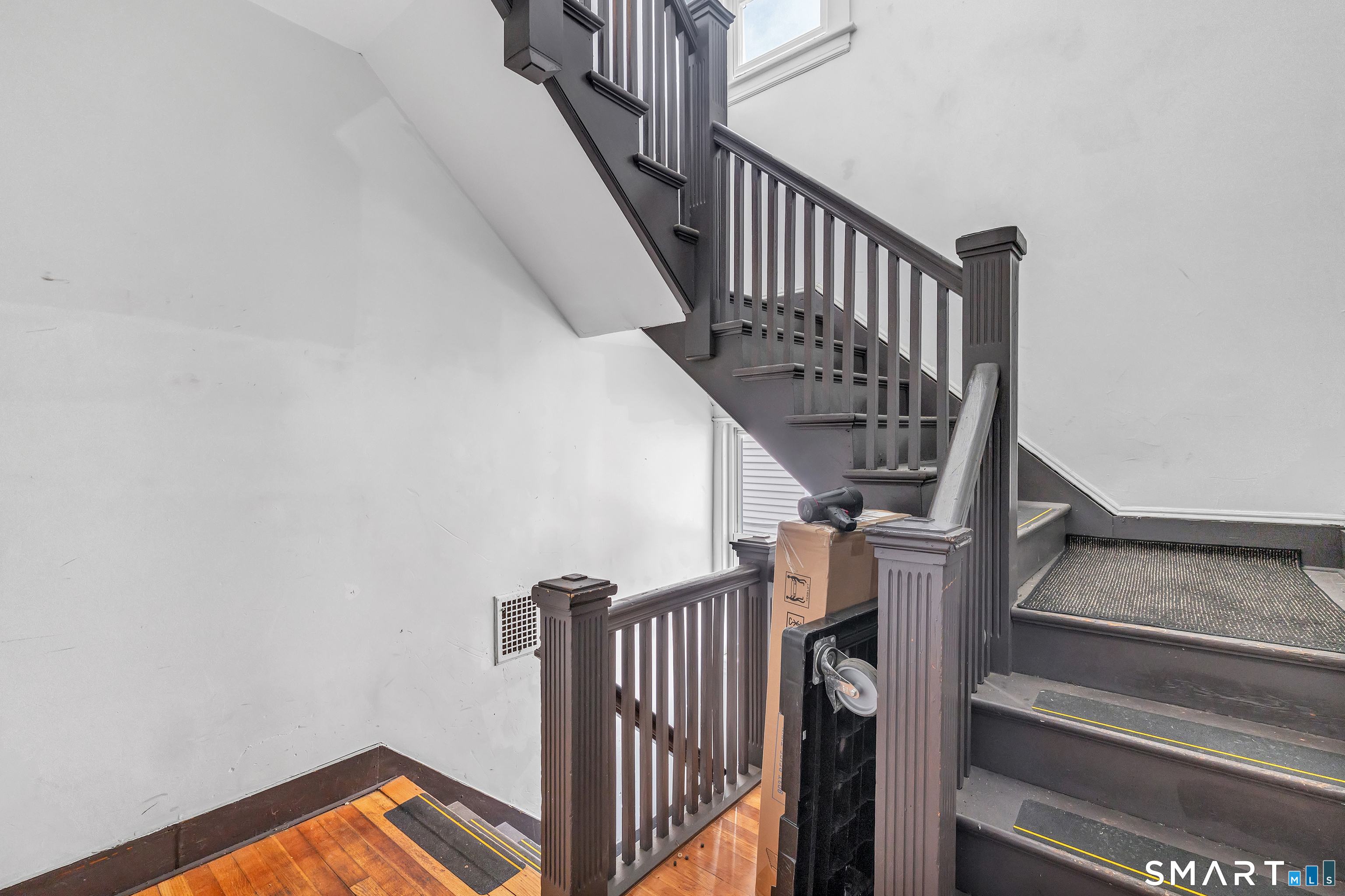189 Wells Street Bridgeport, CT 06606 - Photo 20 of 40 2nd Floor Landing - Note wide staircase and beautifully maintained