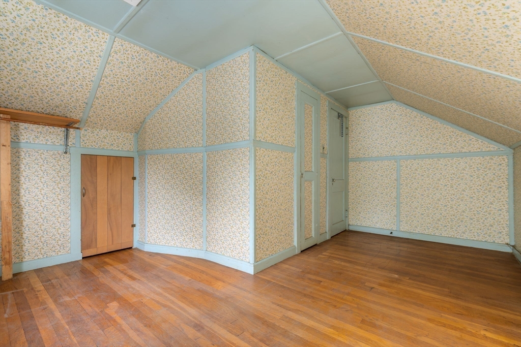 15 Atlantis Street Boston, MA 02132 - Photo 13 of 25 a view of an empty room with wooden floor