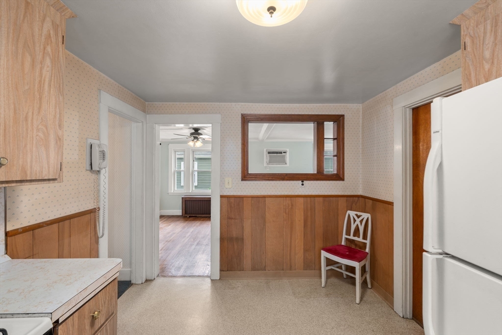 15 Atlantis Street Boston, MA 02132 - Photo 14 of 25 a view of a livingroom with furniture and windows