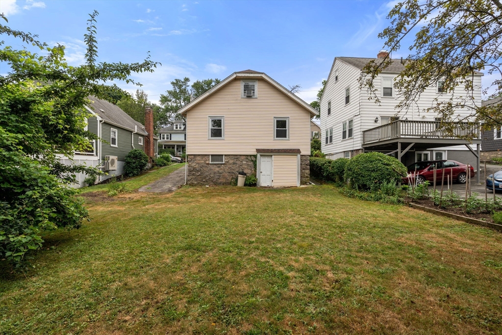 15 Atlantis Street Boston, MA 02132 - Photo 21 of 25 a view of a house with backyard and garden