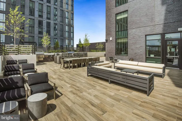 a view of pool with outdoor seating