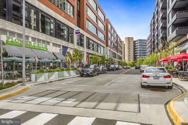 a view of city street with a building and a street view