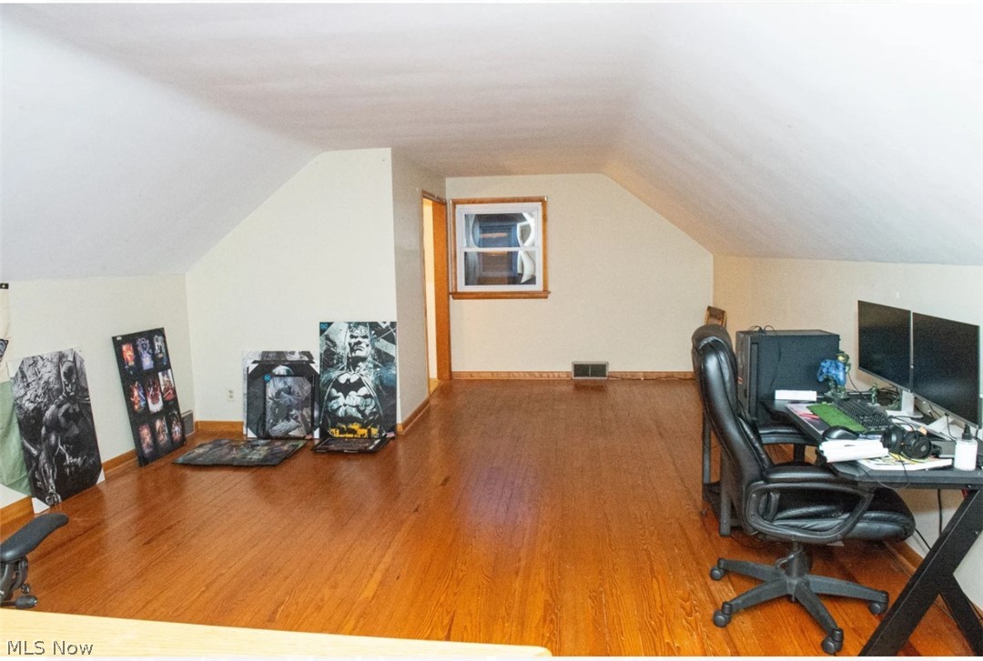 6714 Trenholm Road Youngstown, OH 44512 - Photo 14 of 22 Home office featuring hardwood / wood-style flooring and lofted ceiling