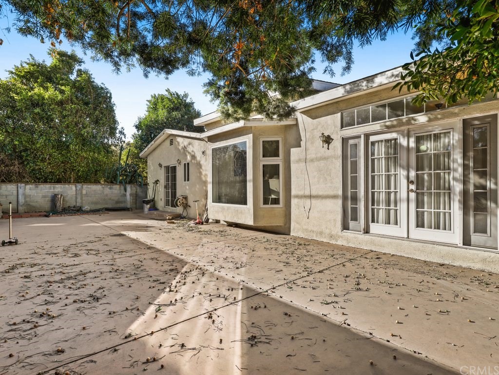 7356 Leescott Avenue Van Nuys, CA 91406 - Photo 28 of 31 a view of a house with a yard