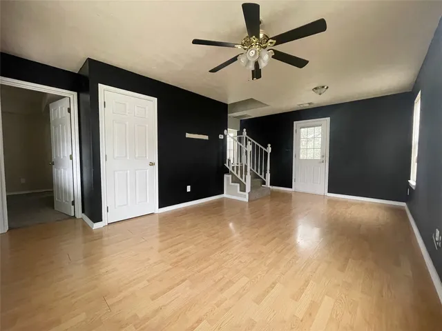 a view of a livingroom with a ceiling fan