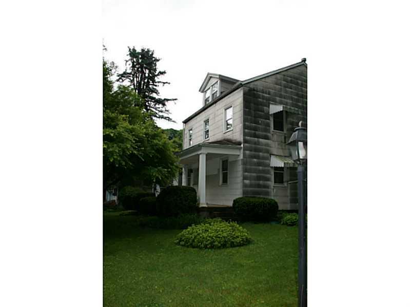 910 Geyer Road Pittsburgh, PA 15209 - Photo 17 of 20 Exterior Front. Large 24 x 13 two car garage with workshop area. Plenty of parking in the private driveway for lots of guests.