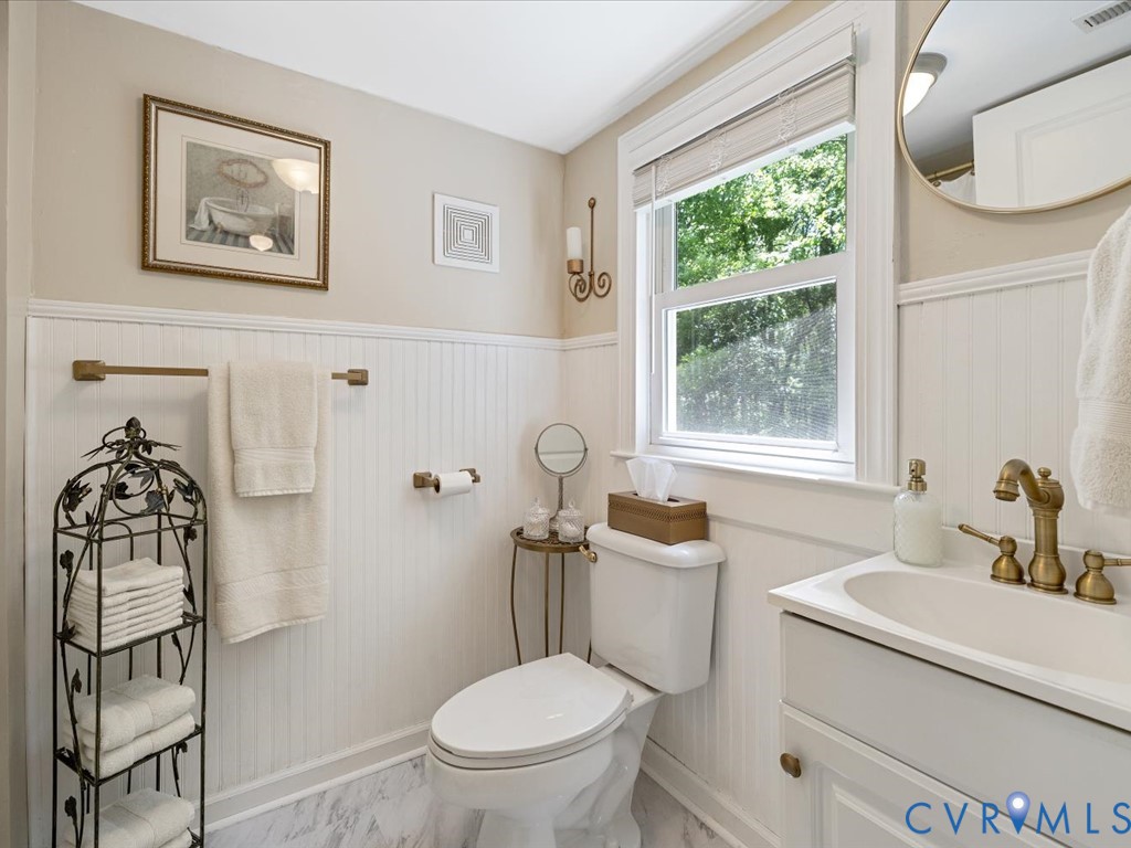 4 Memory Lane Cumberland, VA 23040 - Photo 16 of 37 a bathroom with a toilet a sink and a window