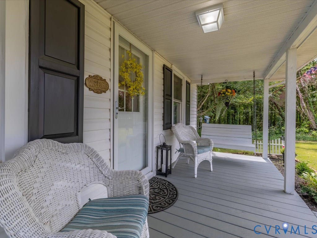 4 Memory Lane Cumberland, VA 23040 - Photo 28 of 37 a bedroom with a bed and wooden floor