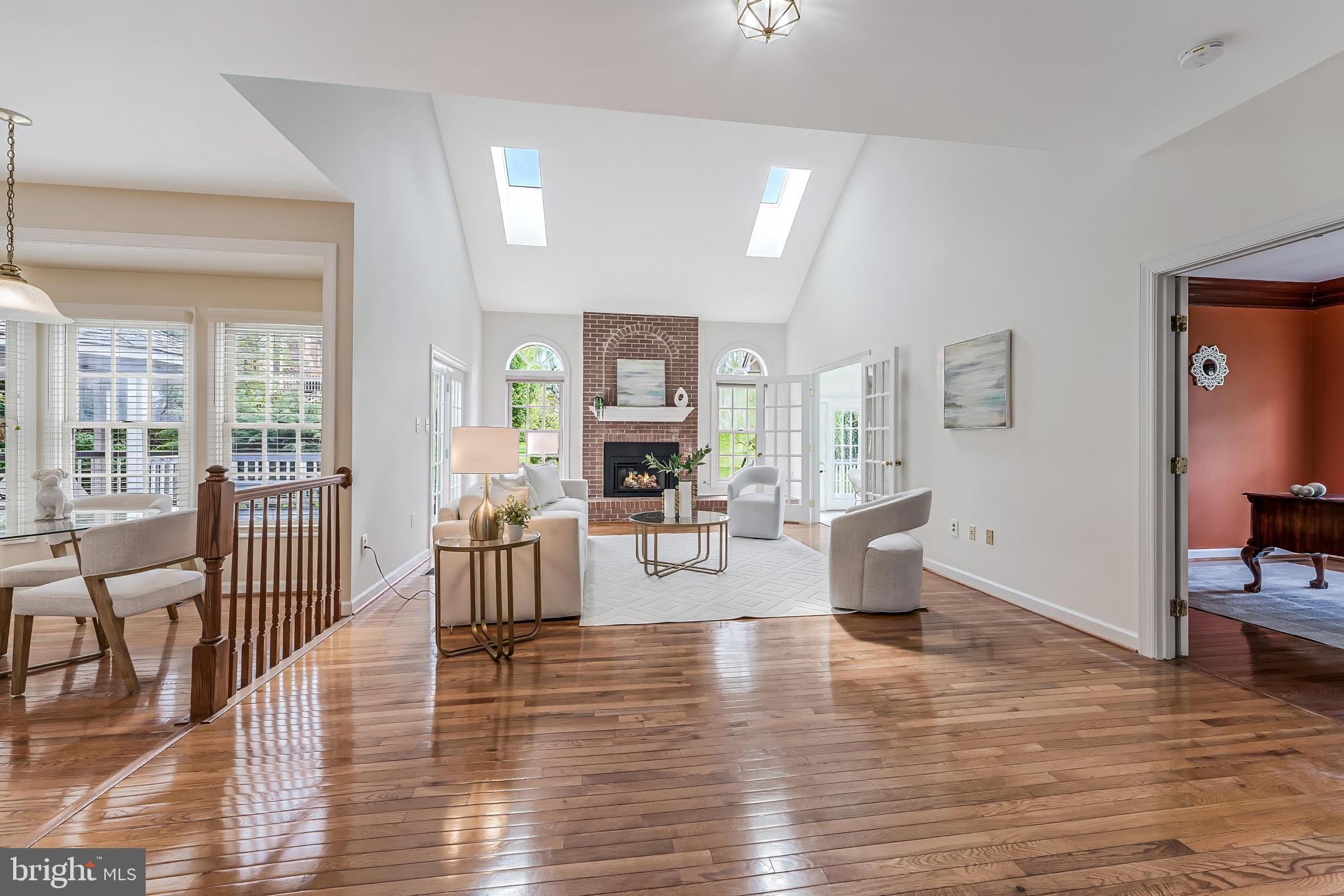 5501 Ashleigh Road Fairfax, VA 22030 - Photo 34 of 77 a living room with furniture and wooden floor