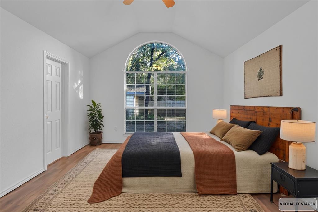 1108 Pine Ridge Drive Azle, TX 76020 - Photo 20 of 40 a spacious bedroom with a bed and a window