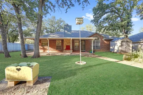 a backyard of a house with seating space