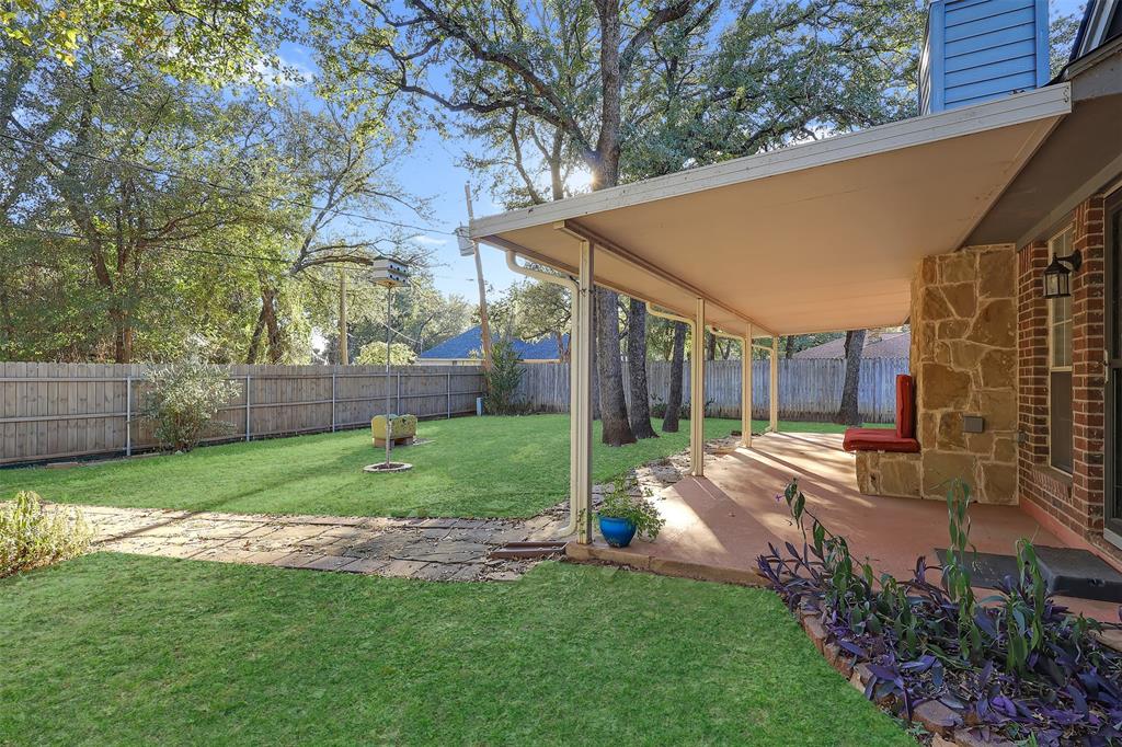 1108 Pine Ridge Drive Azle, TX 76020 - Photo 40 of 40 a view of a house with a backyard