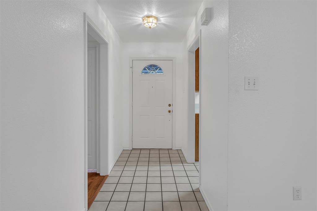 1108 Pine Ridge Drive Azle, TX 76020 - Photo 6 of 40 a view of an empty room