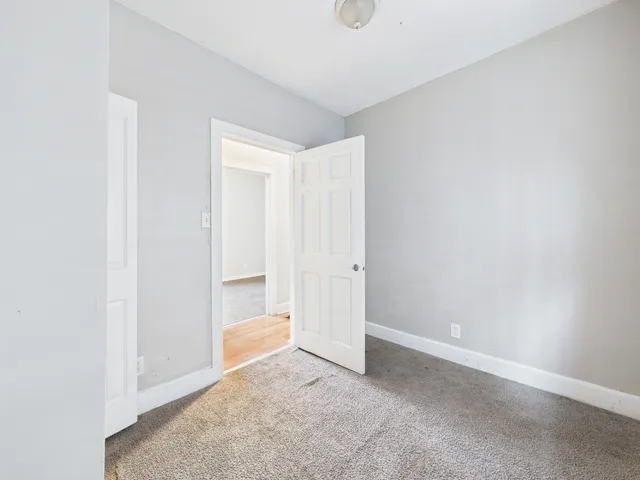 a bath tub sitting next to a white sink