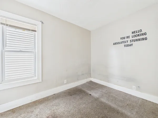 an empty room with a window