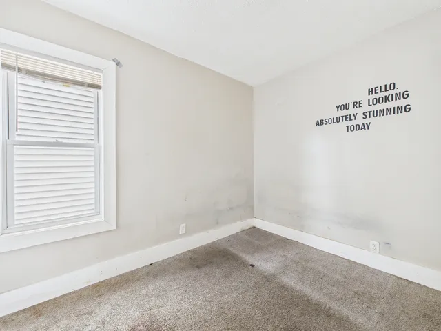 an empty room with a window