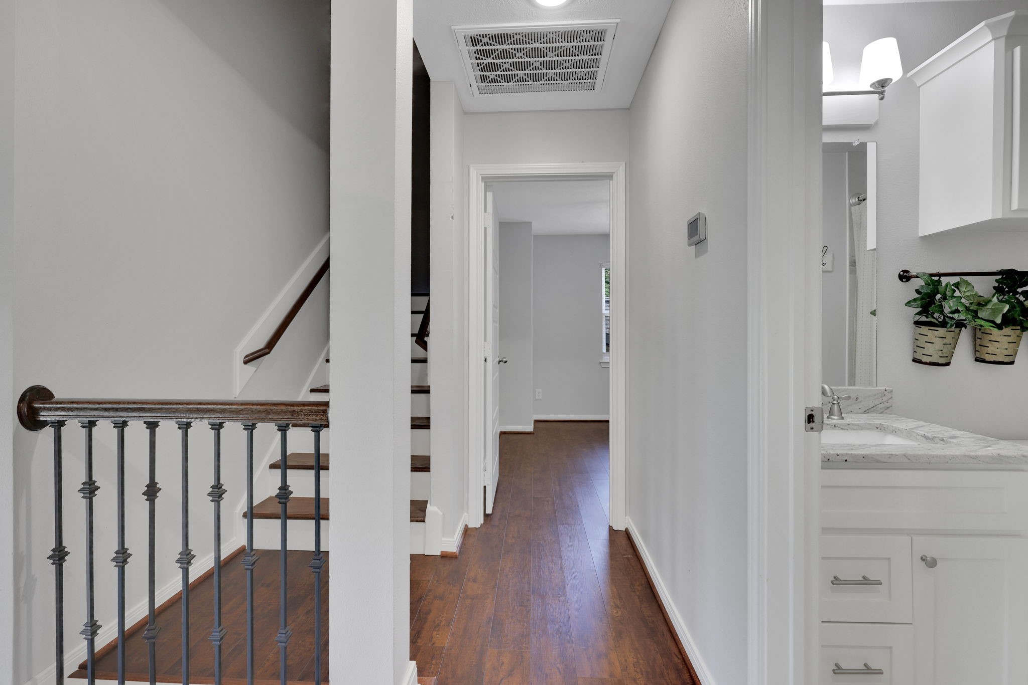 20 Ridgeway Drive Coldspring, TX 77331 - Photo 16 of 40 Hallway leads to guest bathroom and both guest bedrooms.