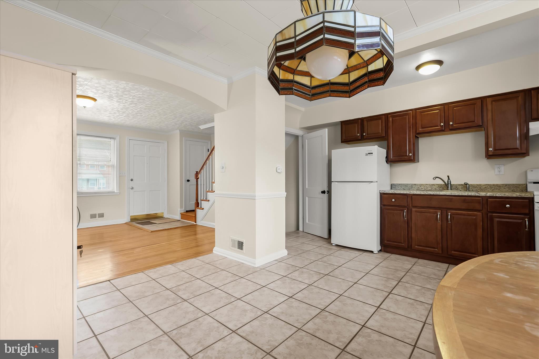 8307 Ridgely Oak Road Baltimore, MD 21234 - Photo 26 of 30 a kitchen with stainless steel appliances a refrigerator and a stove top oven