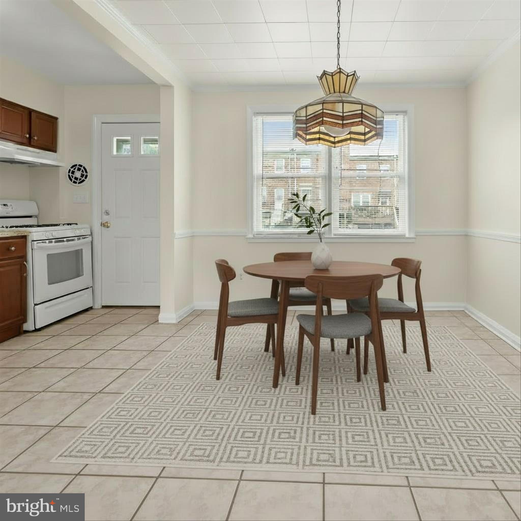 8307 Ridgely Oak Road Baltimore, MD 21234 - Photo 6 of 30 a view of a dining room with furniture and window