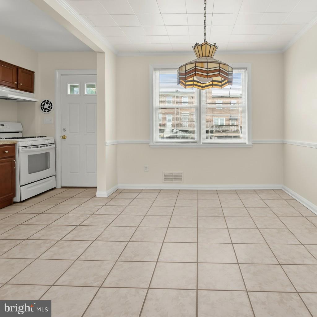 8307 Ridgely Oak Road Baltimore, MD 21234 - Photo 7 of 30 a view of an empty room with a window