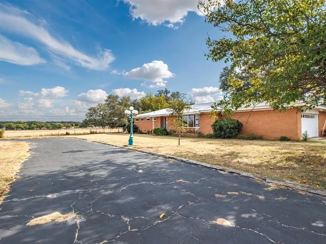 a view of a lake with a house