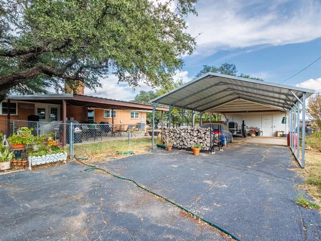 a house view with a outdoor space