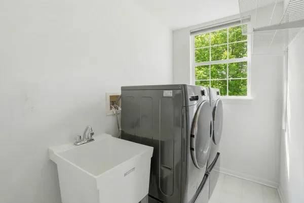 a bathroom with a sink and mirror