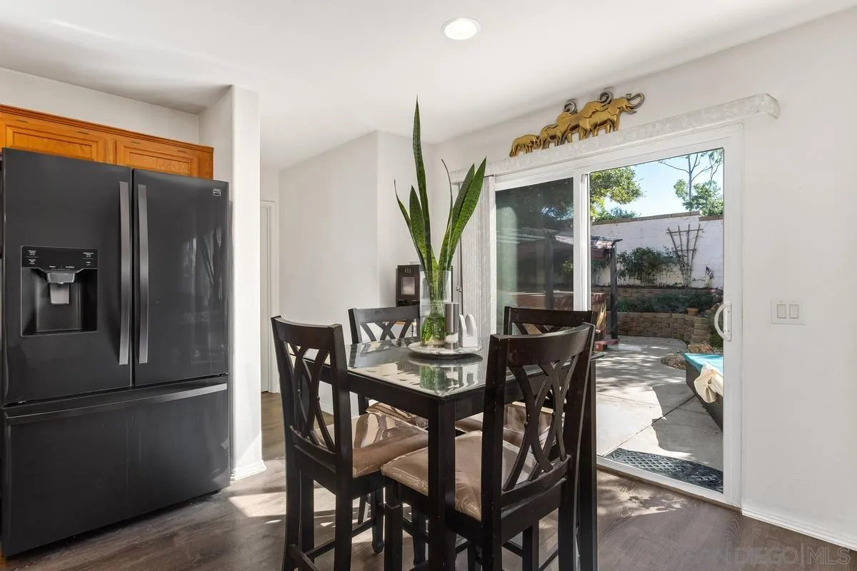 5145 Mendip Street Oceanside, CA 92057 - Photo 13 of 33 a view of a dining room with furniture window and outside view