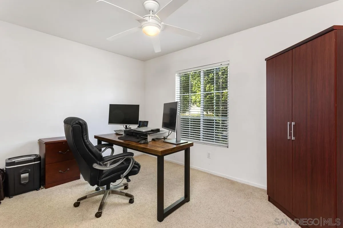 5145 Mendip Street Oceanside, CA 92057 - Photo 14 of 33 a view of a workspace with furniture and a window