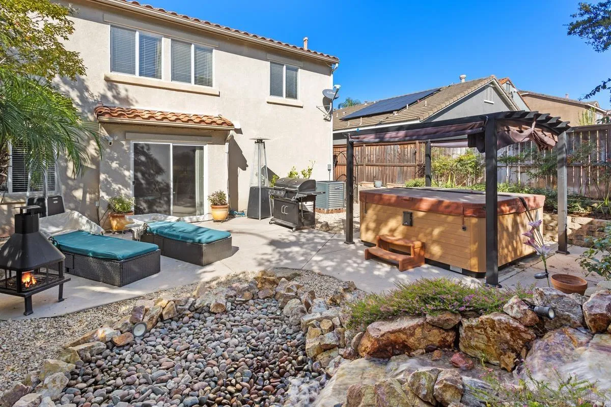5145 Mendip Street Oceanside, CA 92057 - Photo 2 of 33 a view of a house with backyard and sitting area