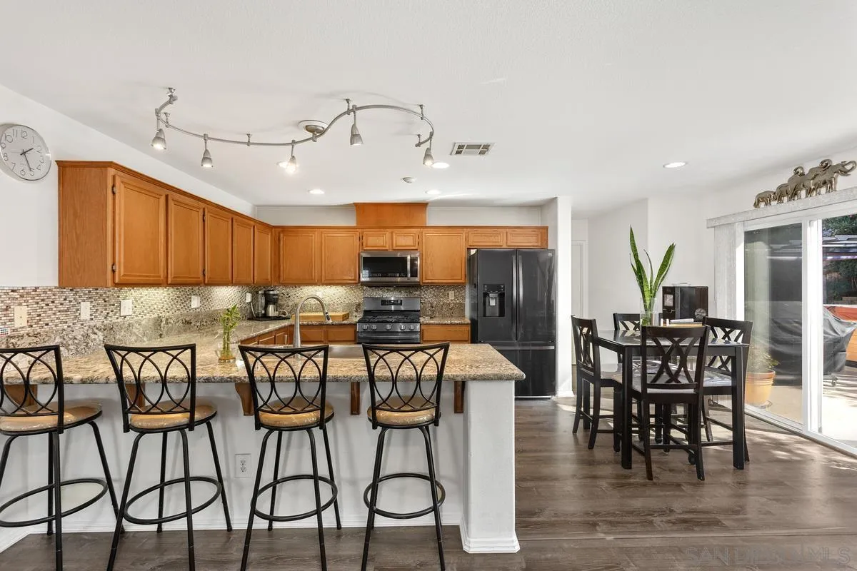 5145 Mendip Street Oceanside, CA 92057 - Photo 3 of 33 a view of a dining room with furniture